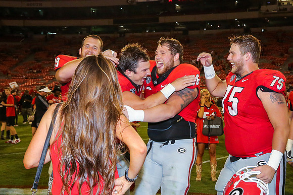 Jake's Proposal to Peyton After the Game by Blane Marable Photog