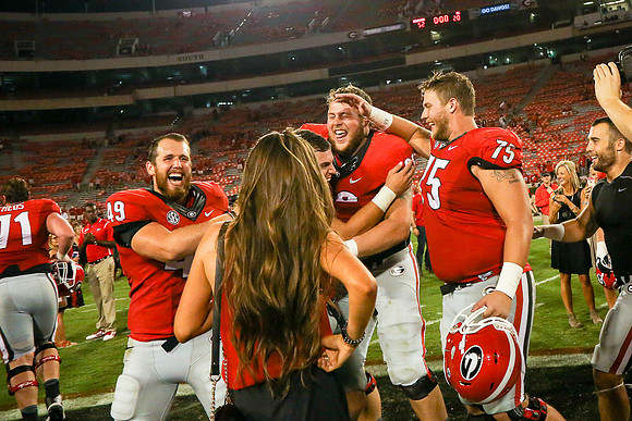 Jake's Proposal to Peyton After the Game by Blane Marable Photog