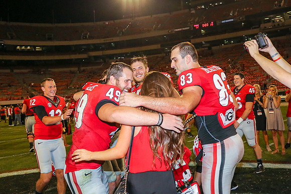 Jake's Proposal to Peyton After the Game by Blane Marable Photog