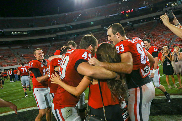 Jake's Proposal to Peyton After the Game by Blane Marable Photog