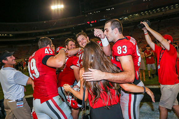 Jake's Proposal to Peyton After the Game by Blane Marable Photog