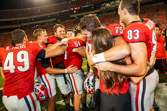 Jake's Proposal to Peyton After the Game by Blane Marable Photog