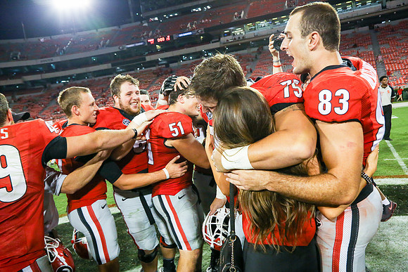 Jake's Proposal to Peyton After the Game by Blane Marable Photog