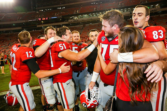 Jake's Proposal to Peyton After the Game by Blane Marable Photog
