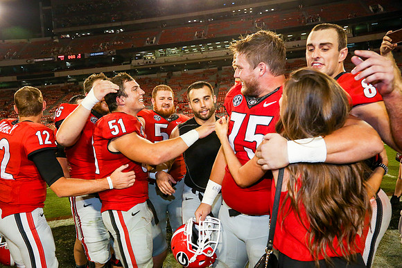Jake's Proposal to Peyton After the Game by Blane Marable Photog