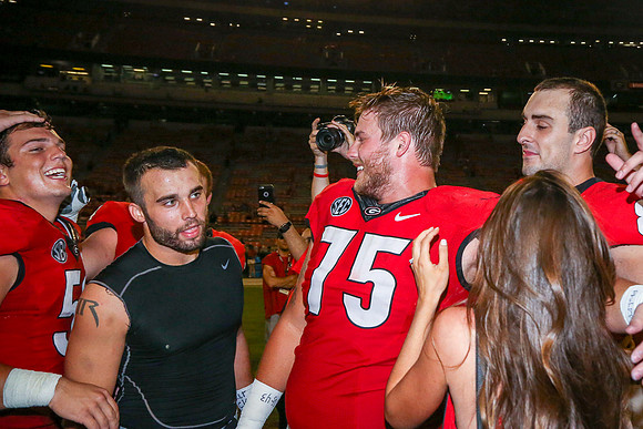 Jake's Proposal to Peyton After the Game by Blane Marable Photog
