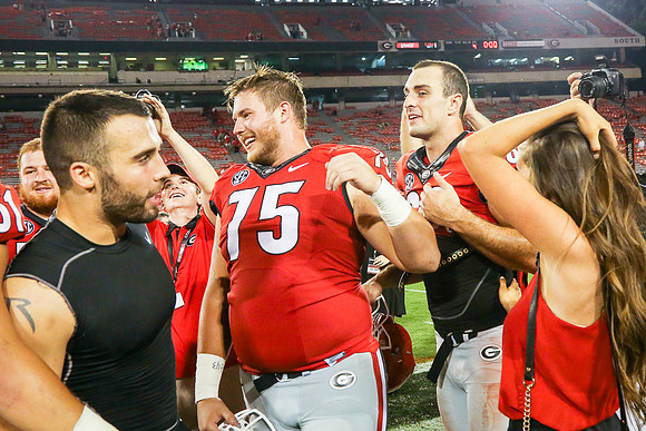 Jake's Proposal to Peyton After the Game by Blane Marable Photog