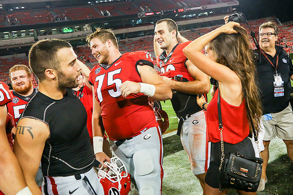 Jake's Proposal to Peyton After the Game by Blane Marable Photog