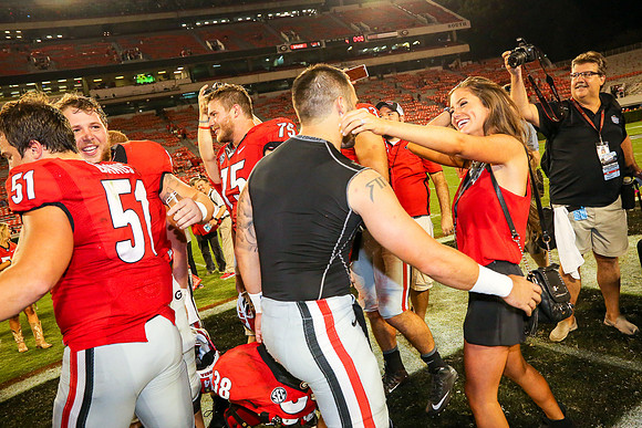 Jake's Proposal to Peyton After the Game by Blane Marable Photog