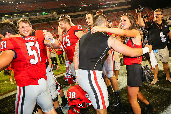 Jake's Proposal to Peyton After the Game by Blane Marable Photog