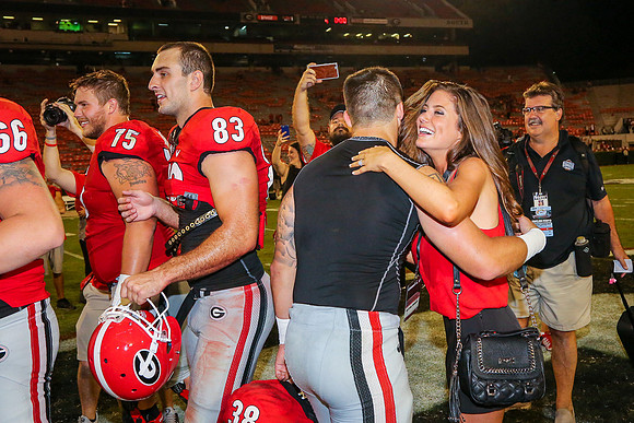 Jake's Proposal to Peyton After the Game by Blane Marable Photog