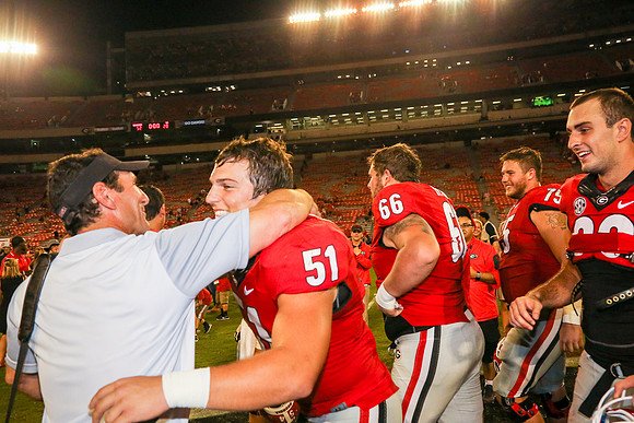 Jake's Proposal to Peyton After the Game by Blane Marable Photog