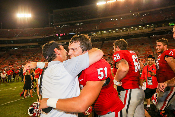 Jake's Proposal to Peyton After the Game by Blane Marable Photog