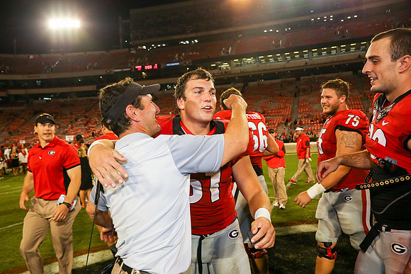 Jake's Proposal to Peyton After the Game by Blane Marable Photog