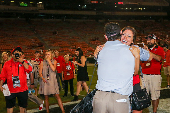 Jake's Proposal to Peyton After the Game by Blane Marable Photog