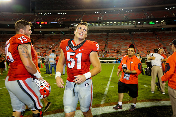 Jake's Proposal to Peyton After the Game by Blane Marable Photog