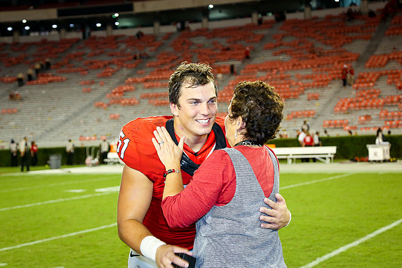 Jake's Proposal to Peyton After the Game by Blane Marable Photog