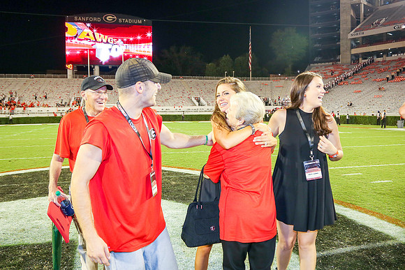 Jake's Proposal to Peyton After the Game by Blane Marable Photog