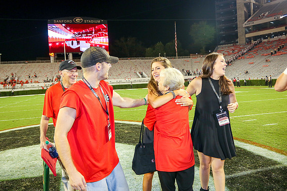 Jake's Proposal to Peyton After the Game by Blane Marable Photog