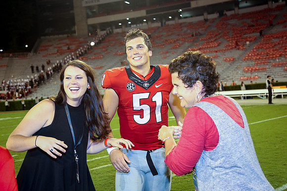 Jake's Proposal to Peyton After the Game by Blane Marable Photog