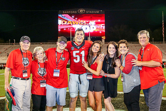 Jake's Proposal to Peyton After the Game by Blane Marable Photog
