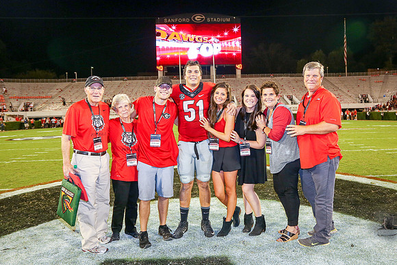 Jake's Proposal to Peyton After the Game by Blane Marable Photog