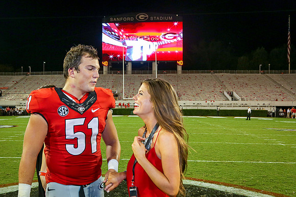 Jake's Proposal to Peyton After the Game by Blane Marable Photog