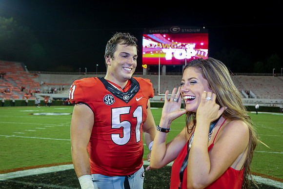 Jake's Proposal to Peyton After the Game by Blane Marable Photog