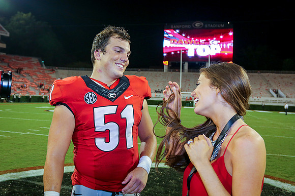 Jake's Proposal to Peyton After the Game by Blane Marable Photog