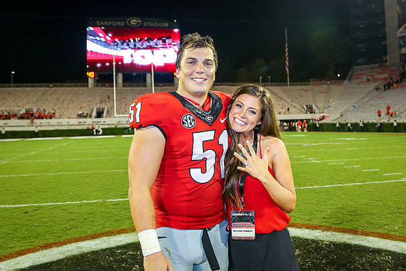 Jake's Proposal to Peyton After the Game by Blane Marable Photog