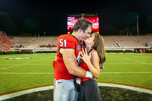 Jake's Proposal to Peyton After the Game by Blane Marable Photog