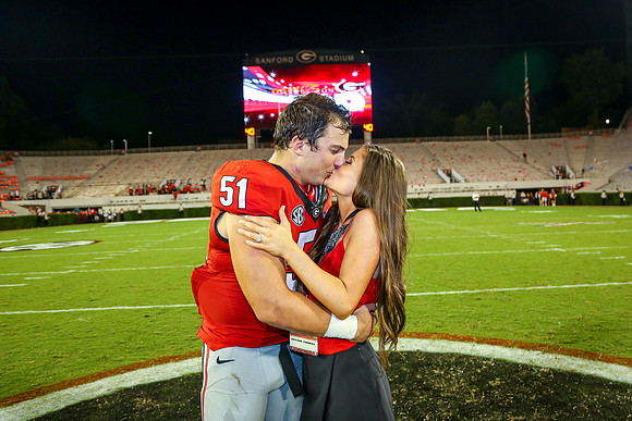 Jake's Proposal to Peyton After the Game by Blane Marable Photog
