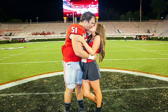 Jake's Proposal to Peyton After the Game by Blane Marable Photog