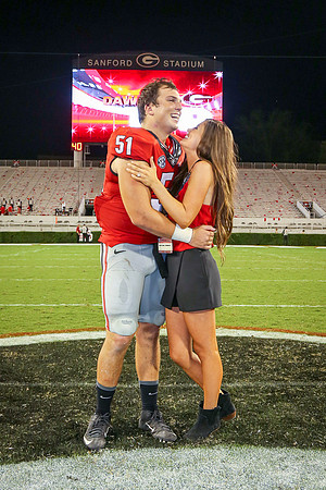 Jake's Proposal to Peyton After the Game by Blane Marable Photog