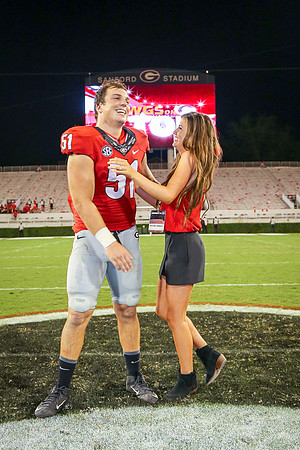Jake's Proposal to Peyton After the Game by Blane Marable Photog