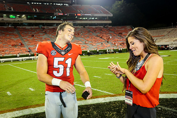 Jake's Proposal to Peyton After the Game by Blane Marable Photog