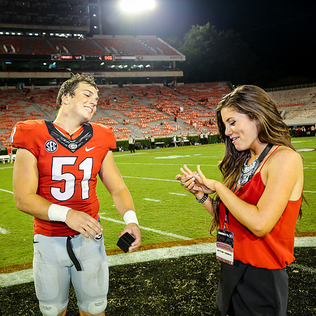 Jake's Proposal to Peyton After the Game by Blane Marable Photog