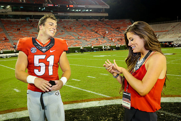 Jake's Proposal to Peyton After the Game by Blane Marable Photog