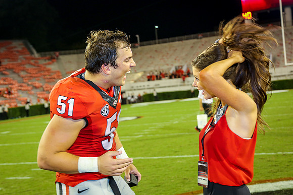 Jake's Proposal to Peyton After the Game by Blane Marable Photog
