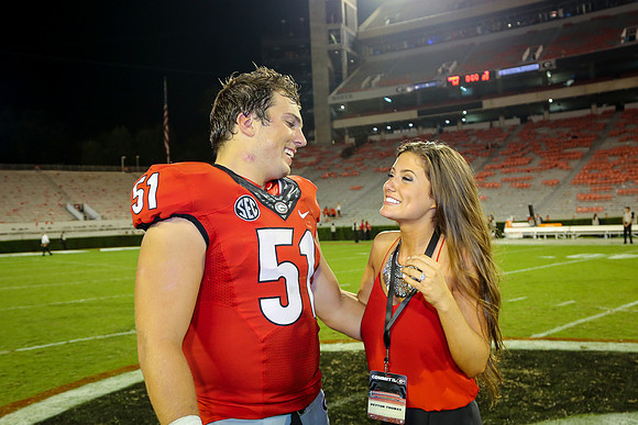 Jake's Proposal to Peyton After the Game by Blane Marable Photog