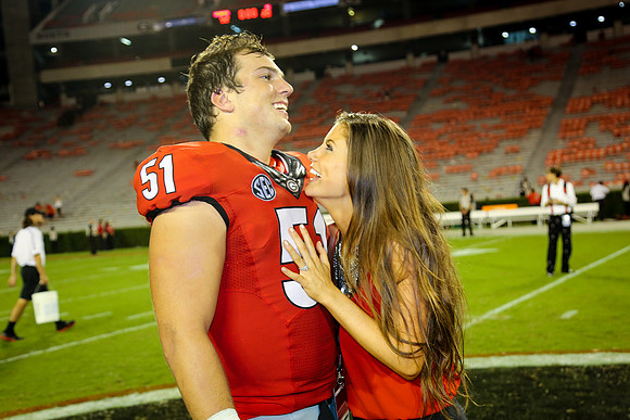 Jake's Proposal to Peyton After the Game by Blane Marable Photog