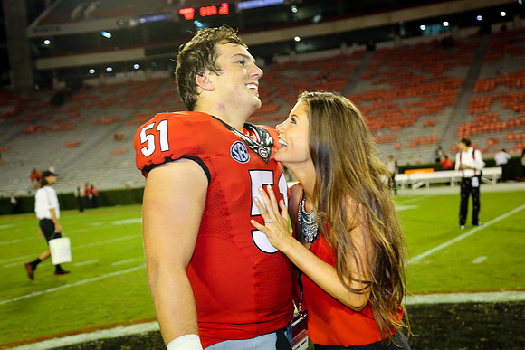 Jake's Proposal to Peyton After the Game by Blane Marable Photog