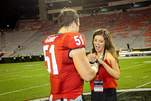 Jake's Proposal to Peyton After the Game by Blane Marable Photog