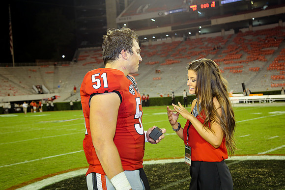 Jake's Proposal to Peyton After the Game by Blane Marable Photog