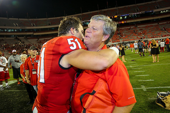 Jake's Proposal to Peyton After the Game by Blane Marable Photog