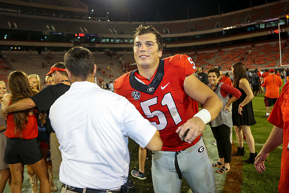 Jake's Proposal to Peyton After the Game by Blane Marable Photog