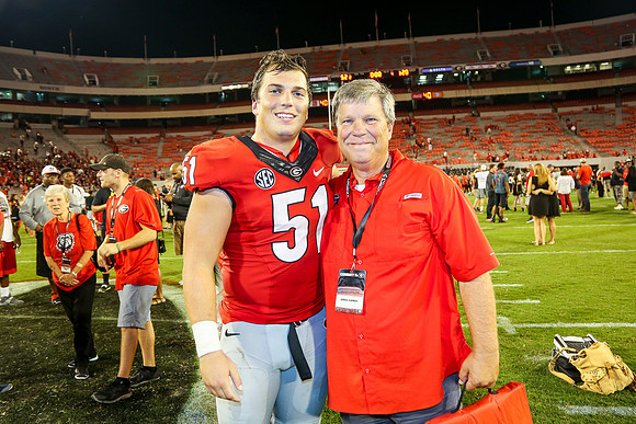Jake's Proposal to Peyton After the Game by Blane Marable Photog