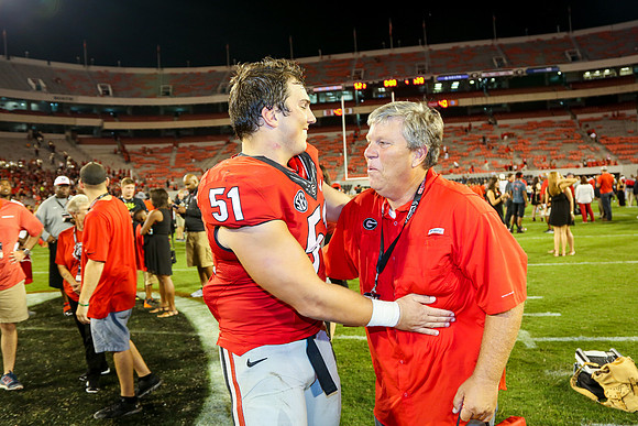 Jake's Proposal to Peyton After the Game by Blane Marable Photog