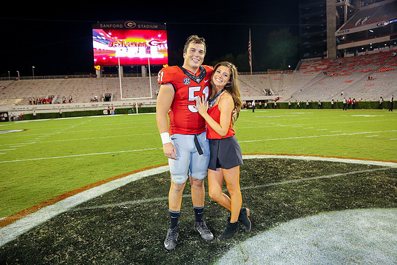 Jake's Proposal to Peyton After the Game by Blane Marable Photog
