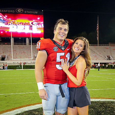 Jake's Proposal to Peyton After the Game by Blane Marable Photog
